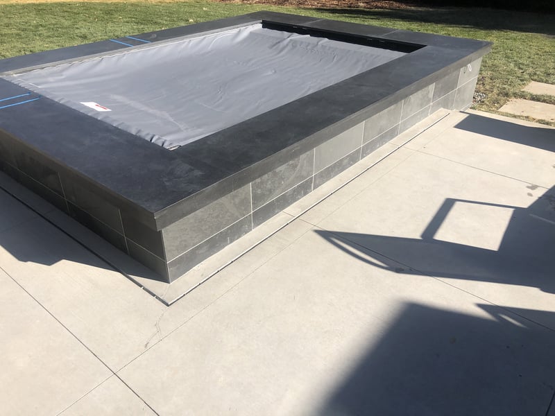 above ground pool overflowing from rain